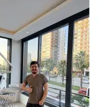 Dt. Ali Duru — Diş Hekimi, Adana. Portre fotoğrafı.