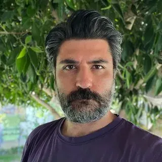 Uzm. Dr. Görkem Yılmaz — Psikiyatri, İstanbul. Portre fotoğrafı.