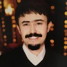Uzm. Dr. Mustafa Kenan Duymaz — Çocuk ve Ergen Psikiyatrisi, Kocaeli. Portre fotoğrafı.