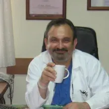 Op. Dr. Turan Erginbaş — Kadın Hastalıkları Ve Doğum, Çanakkale. Portre fotoğrafı.