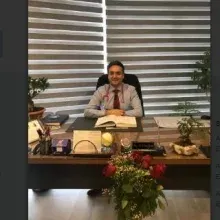 Doç. Dr. Yılmaz Kor — Adana. Portre fotoğrafı.
