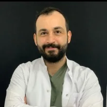 Dt. Onur Sütlü — Diş Hekimi, İstanbul. Portre fotoğrafı.