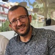 Uzm. Dr. Mehmet Şahin — Çocuk ve Ergen Psikiyatrisi, Aydın. Portre fotoğrafı.