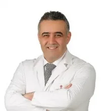 Uzm. Dr. Erol Comart — Çocuk Sağlığı Ve Hastalıkları, Osmangazi, Bursa. Portre fotoğrafı.