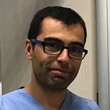 Doç. Dr. Hakan Göktürk — İzmir. Portre fotoğrafı.
