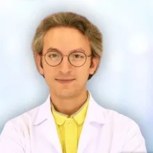 Op. Dr. Orhan Tunalı — Plastik Rekonstrüktif Ve Estetik Cerrahi, Bursa. Portre fotoğrafı.