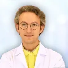 Op. Dr. Orhan Tunalı — Plastik Rekonstrüktif Ve Estetik Cerrahi, Bursa. Portre fotoğrafı.