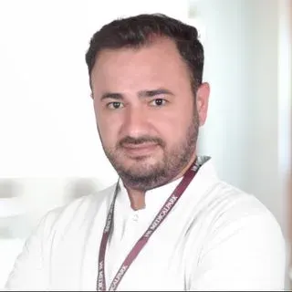 Uzm. Dr. Selami Ay — Bursa. Portre fotoğrafı.