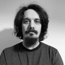 Uzm. Psk. Dan. Erkan Alkan — Psikolojik Danışma ve Rehberlik. Portre fotoğrafı.