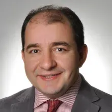 Doç. Dr. Sabri Hergüner — Çocuk ve Ergen Psikiyatrisi, Ankara. Portre fotoğrafı.