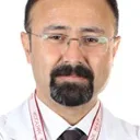 Prof. Dr. Celal Karlıkaya — Göğüs Hastalıkları, İstanbul. Portre fotoğrafı.