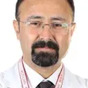 Prof. Dr. Celal Karlıkaya — Göğüs Hastalıkları, İstanbul. Portre fotoğrafı.