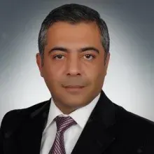 Dr. Öğr. Üyesi Feza Burak — Çukurova, Adana. Portre fotoğrafı.