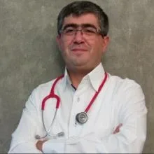 Uzm. Dr. Orhan Sevinç Cura — Çocuk Sağlığı Ve Hastalıkları, Bursa. Portre fotoğrafı.