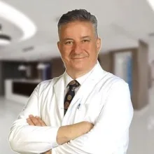 Prof. Dr. Cem Güler — Balçova, İzmir. Portre fotoğrafı.