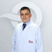 Prof. Dr. Özkan Herek — Çocuk Cerrahisi, Denizli. Portre fotoğrafı.