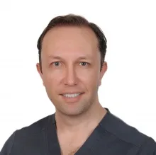 Prof. Dr. Erdem Kılıç — Ağız Diş Ve Çene Cerrahisi, İstanbul. Portre fotoğrafı.