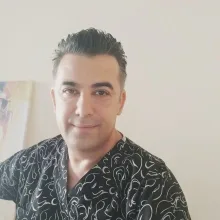 Op. Dr. Fikret İrkin — Genel Cerrahi, İstanbul. Portre fotoğrafı.