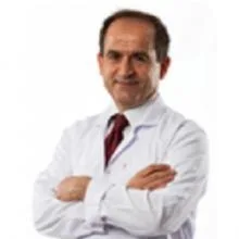 Uzm. Dr. Rüknettin Kurtuluş Özgen — Radyoloji, Antalya. Portre fotoğrafı.
