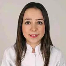 Uzm. Dt. Eylem Coşkun — Periodontoloji, İzmir. Portre fotoğrafı.