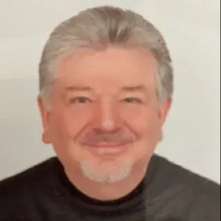 Prof. Dr. Mehmet Erkan Üstün — Beyin Ve Sinir Cerrahisi, Ankara. Portre fotoğrafı.