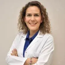Doç. Dr. Özlem Koşar Can — Kadın Hastalıkları Ve Doğum, Denizli. Portre fotoğrafı.