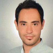 Op. Dr. Ercüment Tombalak — Genel Cerrahi. Portre fotoğrafı.