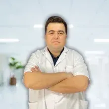 Uzm. Dr. Hakan Baş — Radyoloji, Çankaya, Ankara. Portre fotoğrafı.