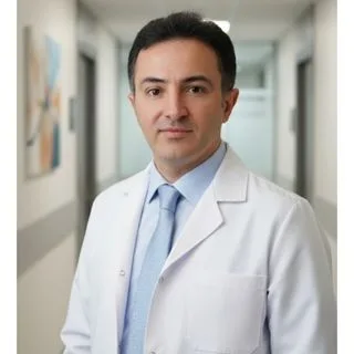 Op. Dr. Erhan Şit — Genel Cerrahi, İstanbul. Portre fotoğrafı.
