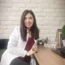 Dt. Dilara Elmacı — Diş Hekimi, Nilüfer, Bursa. Portre fotoğrafı.