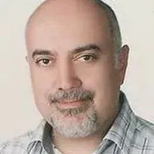Uzm. Dr. Süleyman Alper Tecer — Psikiyatri, İzmir. Portre fotoğrafı.