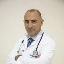 Op. Dr. Müşteba Sevil — Üroloji, İstanbul. Portre fotoğrafı.