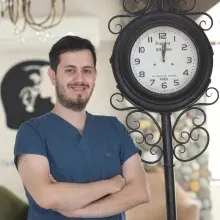 Dt. Bestami Coşkun — Diş Hekimi, Bursa. Portre fotoğrafı.