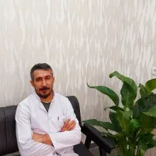 Dt. Abuzer Yanak — Diş Hekimi, Adıyaman. Portre fotoğrafı.