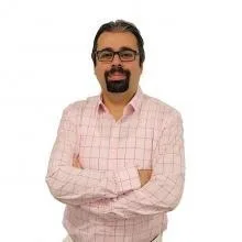 Uzm. Dr. Enver Demirel Yılmaz — Psikiyatri, İstanbul. Portre fotoğrafı.