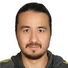 Dr. Ahmetjan Rozyyev — Pratisyen, İstanbul. Portre fotoğrafı.