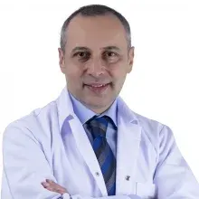 Op. Dr. Ferşat Muhacir — Göz Hastalıkları, Antalya. Portre fotoğrafı.