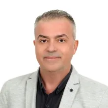 Dr. Bekir Hucuptan — İzmir. Portre fotoğrafı.
