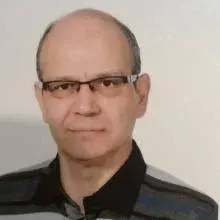 Uzm. Dr. Mehmet Erdeniz Kılcı — Nöroloji, Ankara. Portre fotoğrafı.