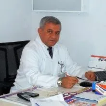 Op. Dr. Ali Nurhan Özbaba — Plastik Rekonstrüktif Ve Estetik Cerrahi. Portre fotoğrafı.