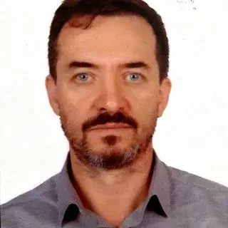 Doç. Dr. İsmet Gün — Kadın Hastalıkları Ve Doğum. Portre fotoğrafı.