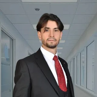 Uzm. Dr. Ertan Atabey — Adana. Portre fotoğrafı.