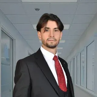 Uzm. Dr. Ertan Atabey — Adana. Portre fotoğrafı.