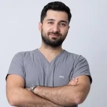 Dt. Serhat Aydoğdu — Diş Hekimi, İzmir. Portre fotoğrafı.