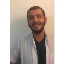 Dt. Oğuzhan Bostancı — Diş Hekimi, Ankara. Portre fotoğrafı.