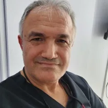 Op. Dr. Mustafa Şahin — Kadın Hastalıkları Ve Doğum, Antalya. Portre fotoğrafı.