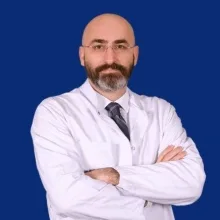 Doç. Dr. Emre Özker — Kalp Ve Damar Cerrahisi, İstanbul. Portre fotoğrafı.