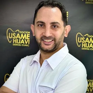 Dt. Usame Hejavi — Diş Hekimi, İstanbul. Portre fotoğrafı.
