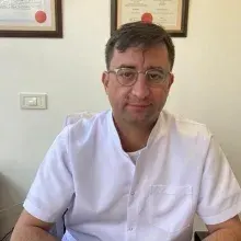 Doç. Dr. H. Bahadır Saatlı — Kadın Hastalıkları Ve Doğum, İzmir. Portre fotoğrafı.