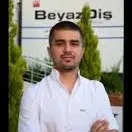 Dt. Türker Karcı — Diş Hekimi, Adana. Portre fotoğrafı.